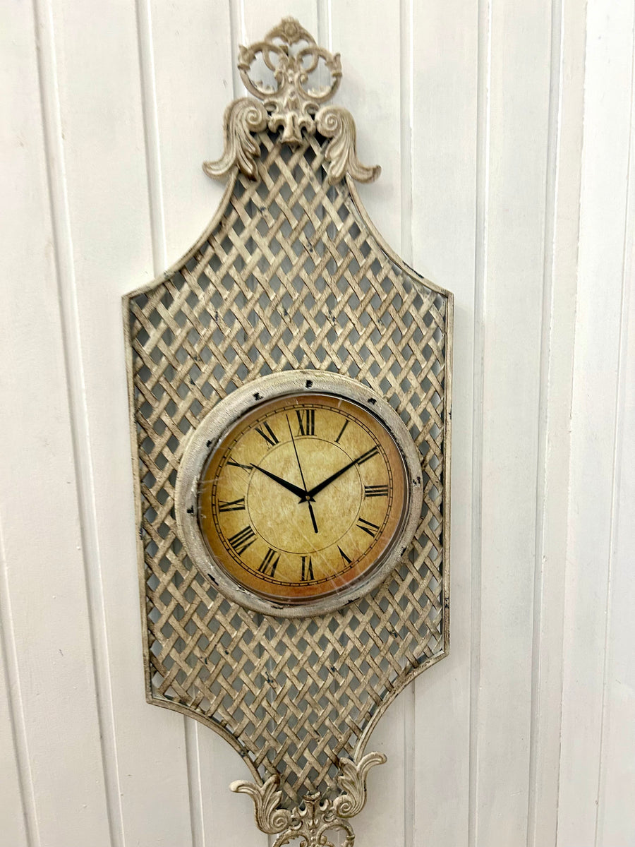 French Provincial Style Clock on Metal Wall Hanging.