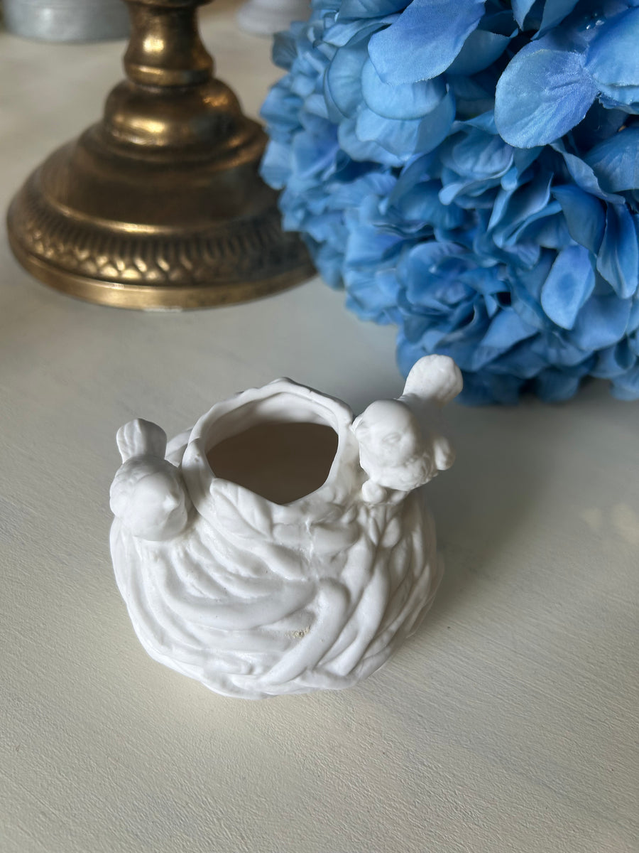 White Ceramic Bird Near candle holder