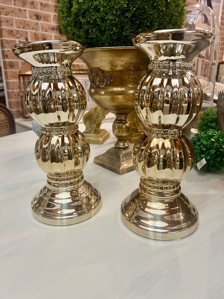 Wide gold coloured candle holder