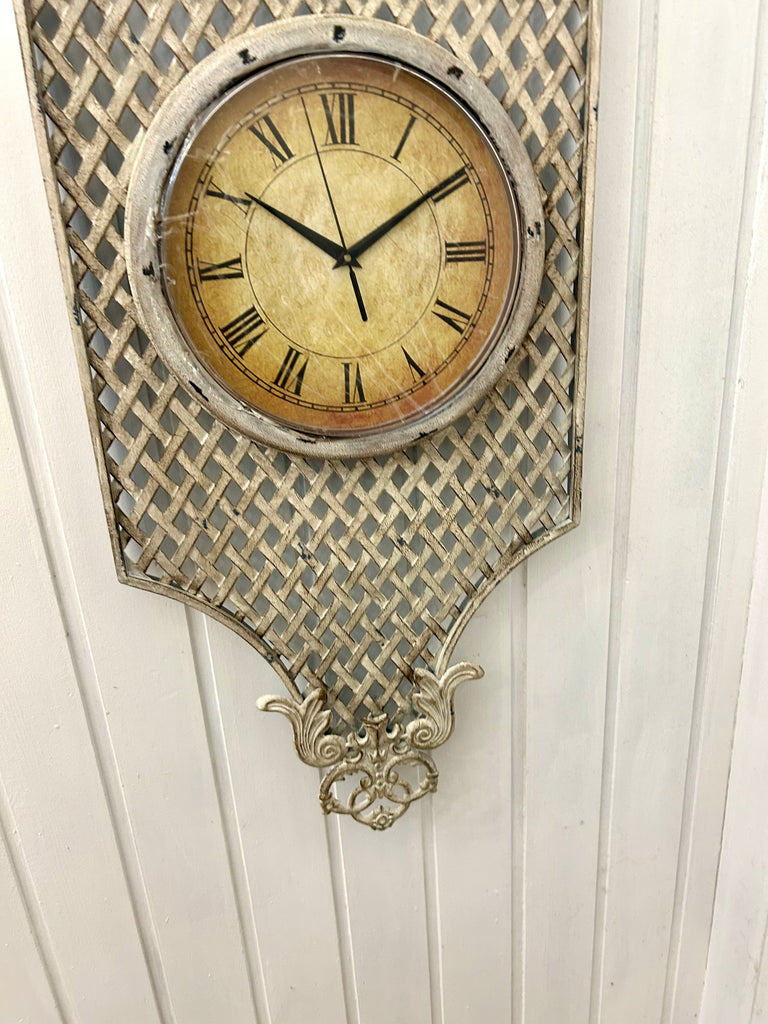 French Provincial Style Clock on Metal Wall Hanging.