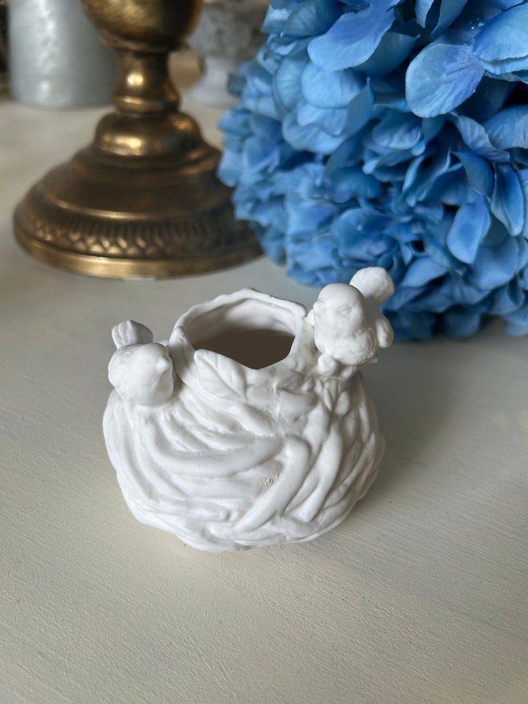 White Ceramic Bird Near candle holder