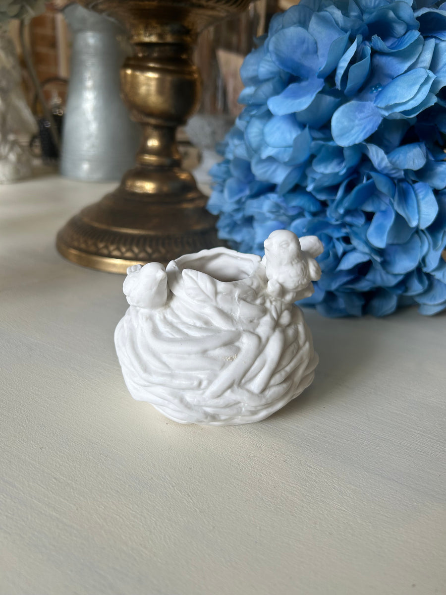 White Ceramic Bird Near candle holder