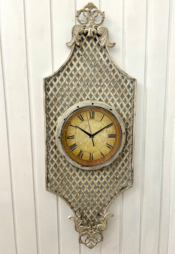 French Provincial Style Clock on Metal Wall Hanging.