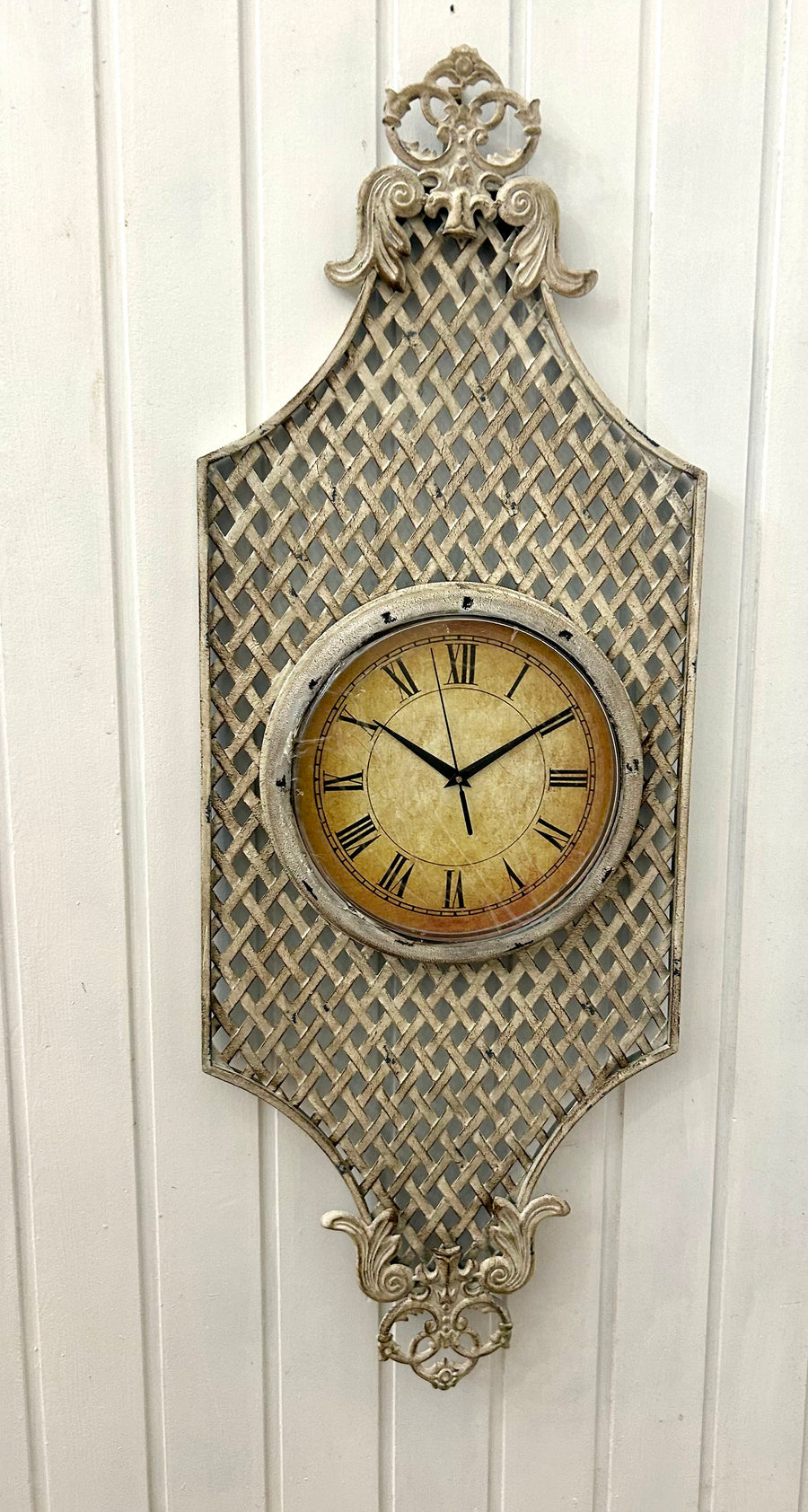 French Provincial Style Clock on Metal Wall Hanging.
