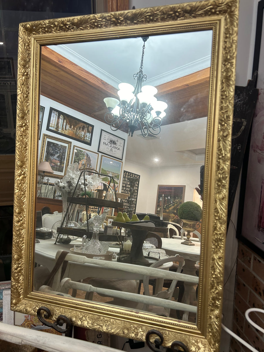 Gold framed mirror