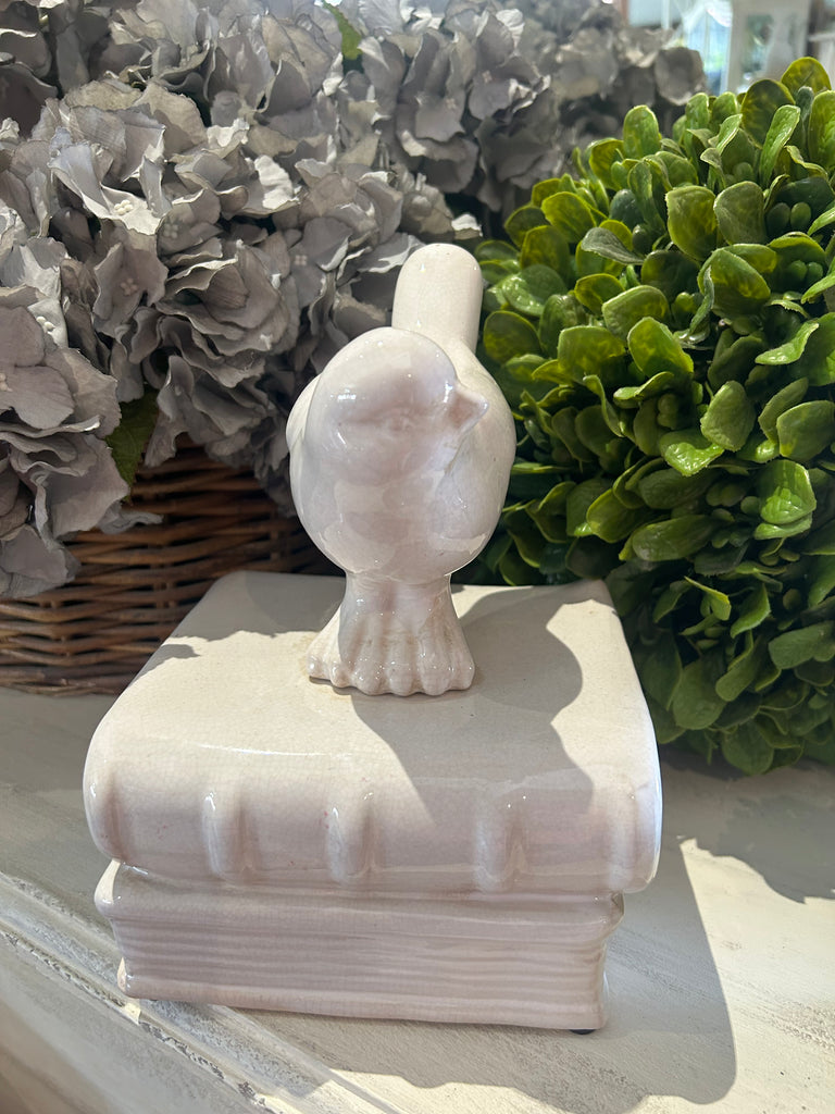 Decorative Ceramic Bird on Books