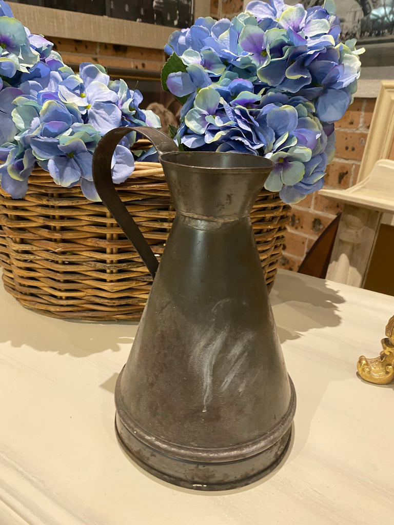 Vintage metal oil jug
